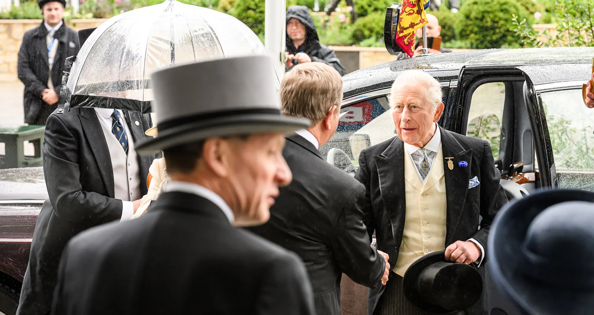 King Charles arriving at the Epsom Racecourse