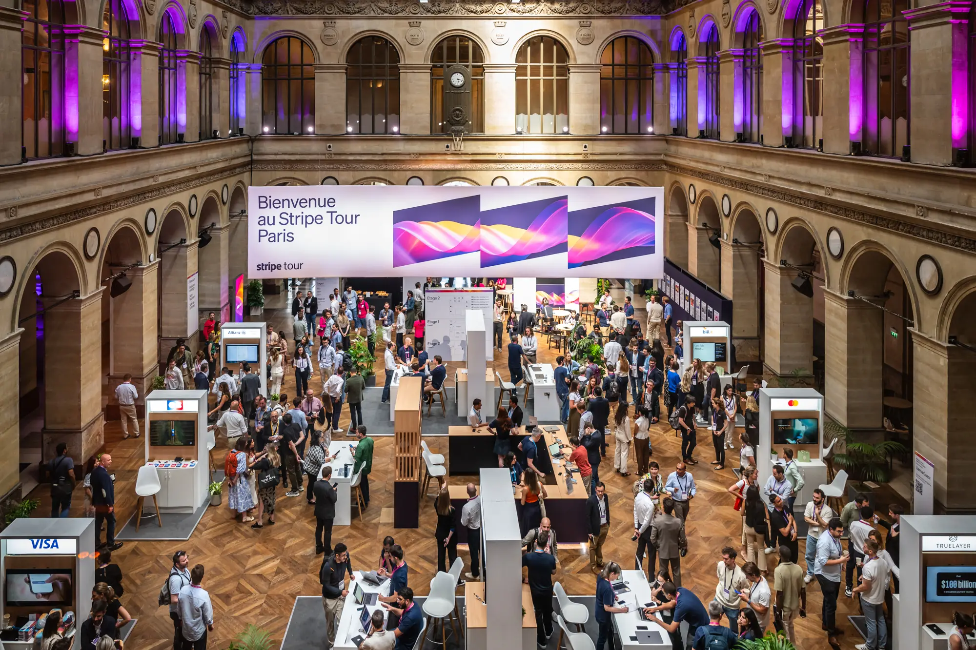 Elevated view of the exhibition hall at Palais Brongniart during Stripe Tour Paris 2025